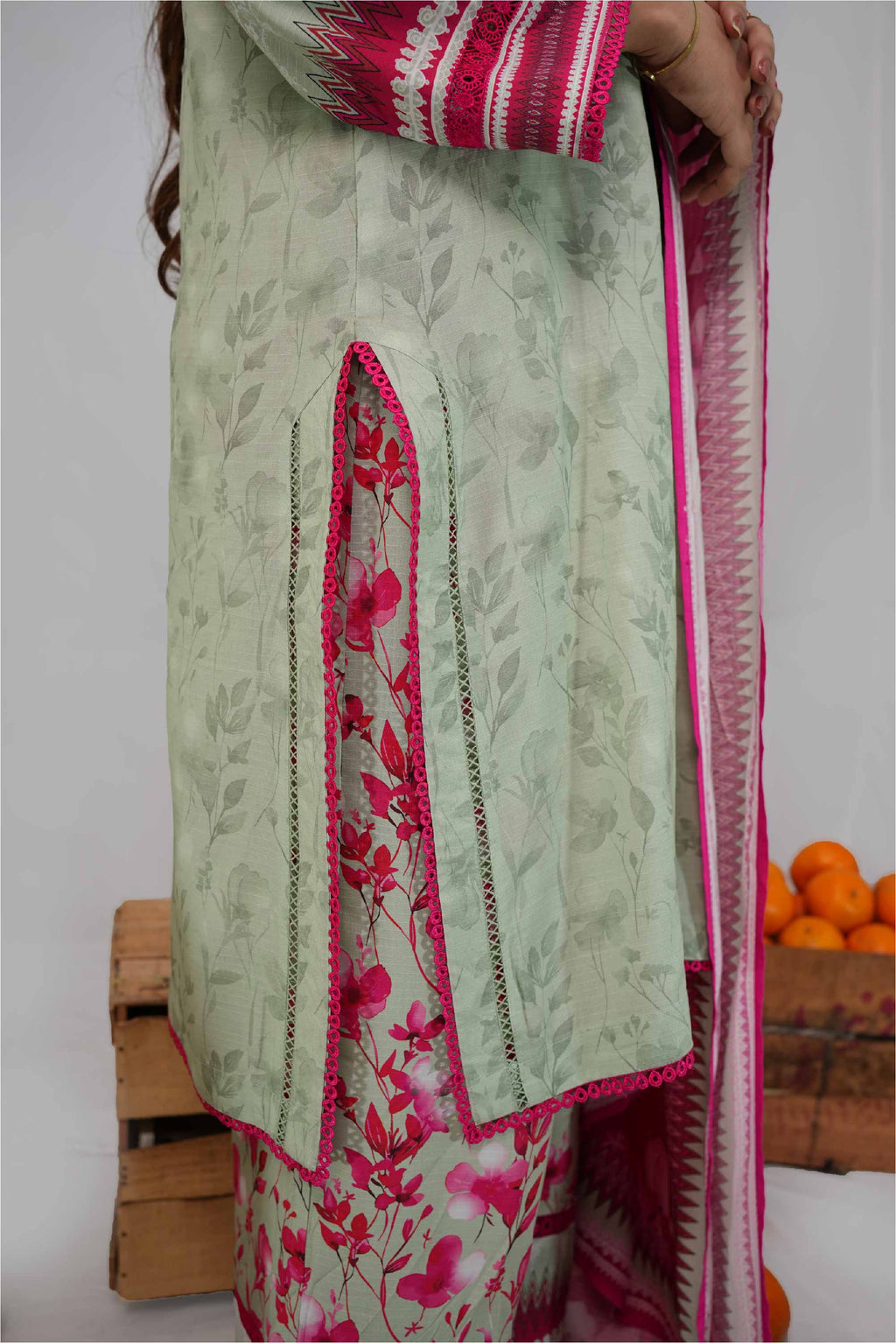 Traditional outfit with floral patterns and a white background